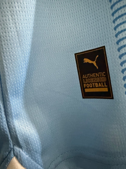 Manchester City 2023-2024 Home Shirt signed by Rico Lewis (COA)